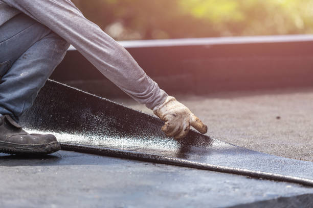 Professional Basement Waterproofing technician working in Crossville, AL